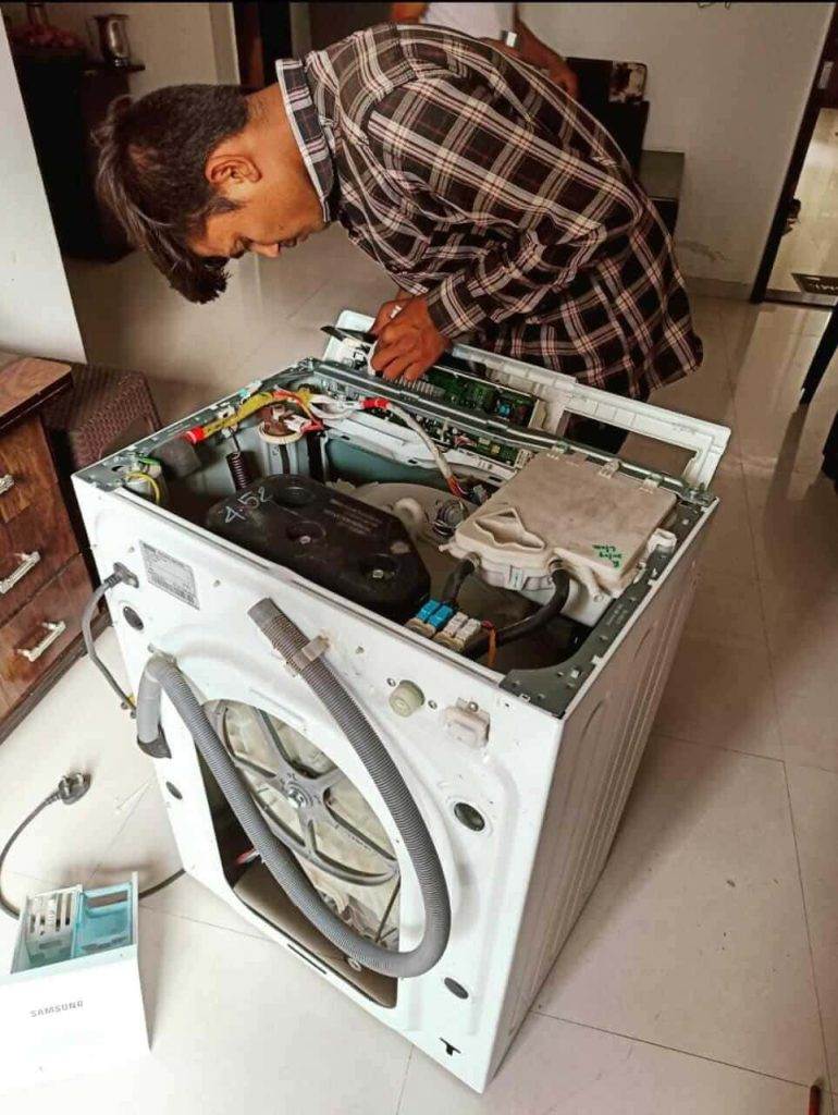 Front Load Washing Machine repairing by Revamp Services