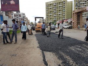 IMG-20160721-WA008 Filling up of Potholes on Kunal Icon Road | filling up of potholes on kunal icon road
