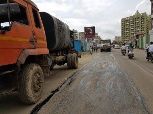 IMG-20160721-WA009 Filling up of Potholes on Kunal Icon Road | filling up of potholes on kunal icon road